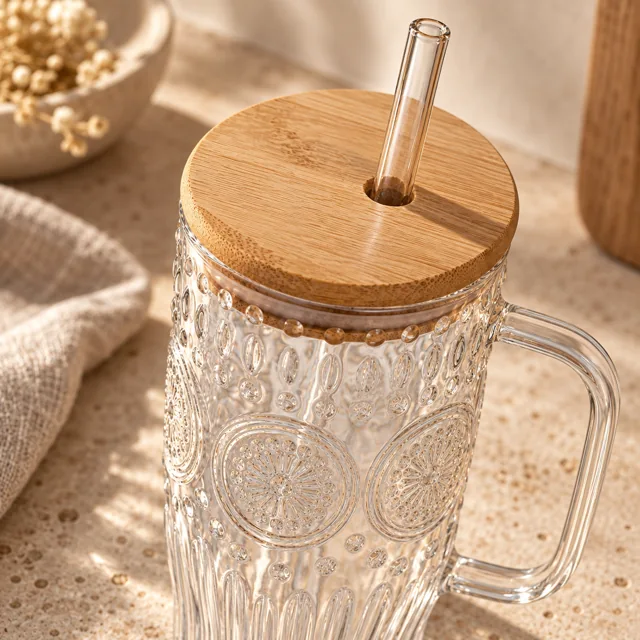 Close-up of the bamboo lid, glass straw and embossed vintage glass