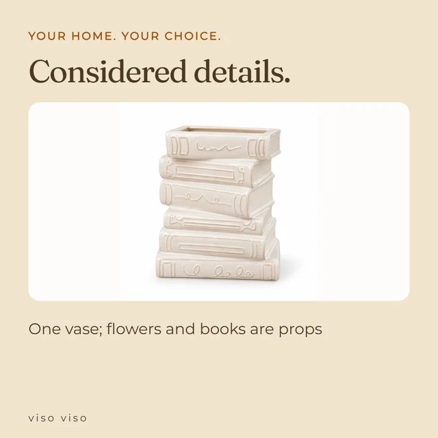 One vase; flowers and books are props